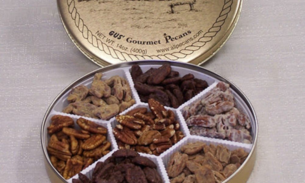 Pecan gift tin with a variety of candied pecans inside