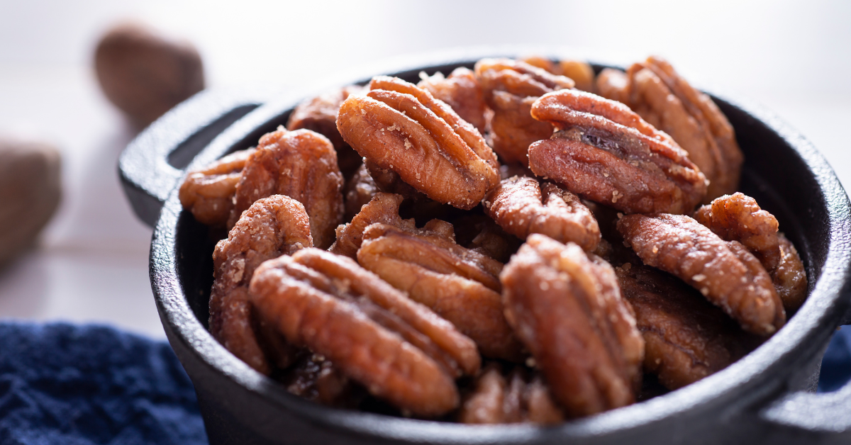 a bowl of roasted pecans