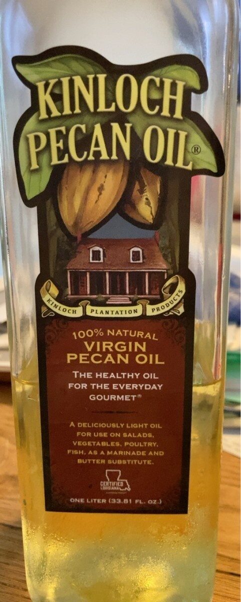 a closeup of a bottle of virgin pecan oil